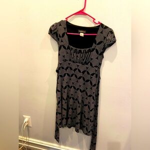 Black and white patterned tie back knee length dress